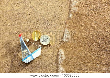 Beautiful sea composition on sand beach background