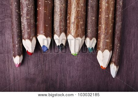 decorative pencil on a brown background