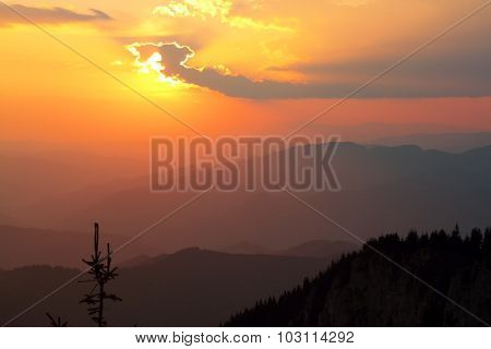 Orange Sunset Over The Mountains