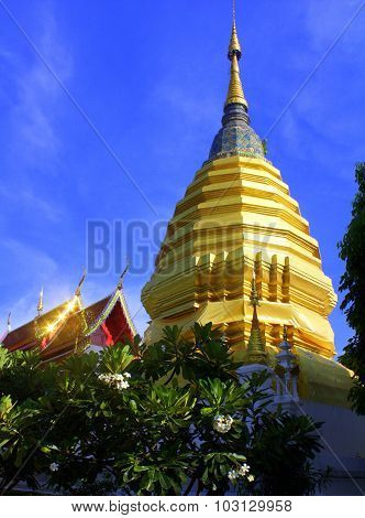 Golden stupa and gleaming temple
