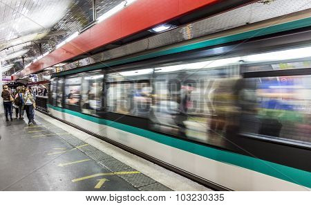 Travellers And Commuters Waiting At Subway Station