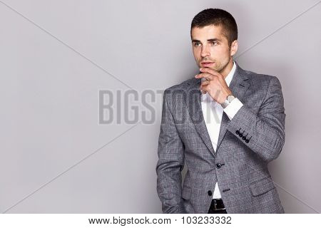handsome young man wears a watch