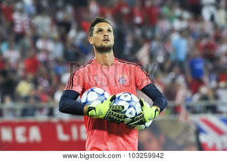 Goalkeeper Sven Ulreich Holding Balls During The Uefa Champions League Game Between Olympiacos And B