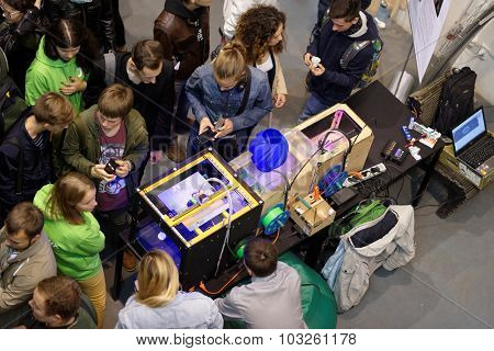 ST. PETERSBURG, RUSSIA - SEPTEMBER 19, 2015: People at the Fab Lab Polytech area during PolyFest. It's the Europe largest university festival of scientific achievements of young people