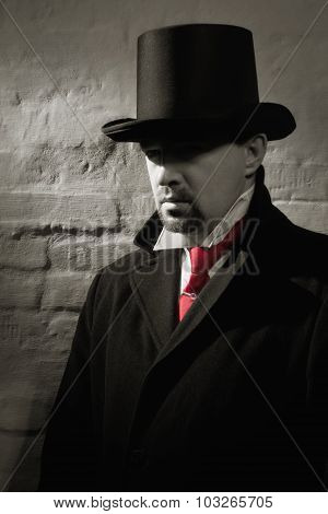 Man In The Black Coat, Top Hat And In A Red Tie