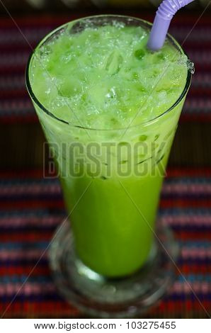 Matcha Green Tea Latte Clod  On Wooden Table Background