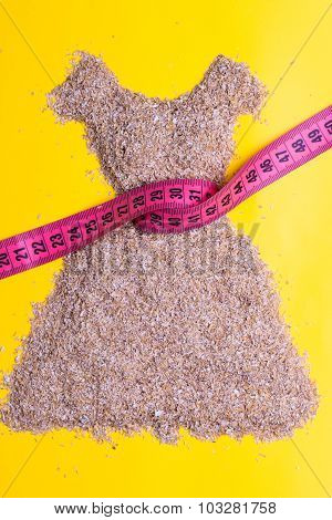 Dress Shape Made From Bran With Measure Tape