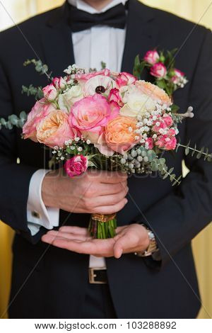 Wedding Bouquet In Groom Hand