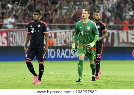 Arturo Vidal (r) Manuel Neuer (c) And Douglas Costa (l) During The Uefa Champions League Game Betwee