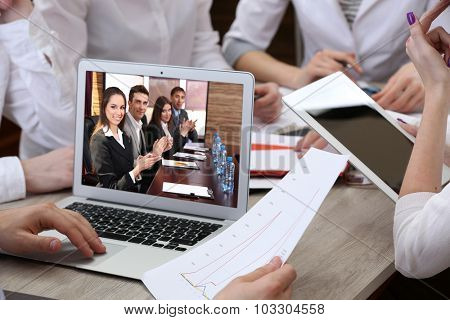 Portrait of business peoples attending video conference