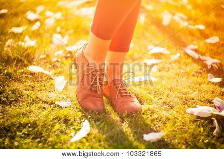 Beautiful Girl On Green Summer Grass, Smiling And Happy