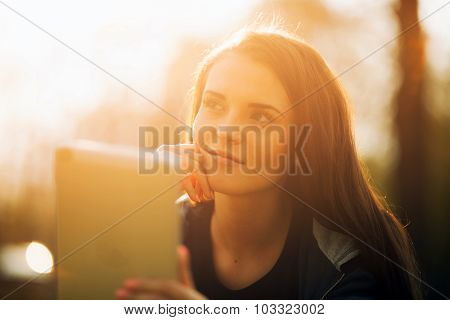 Beautiful Girl With Tablet Or Ebook Outdoor