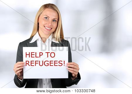 Smiling Woman Holding A White Banner With Words 