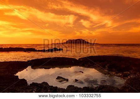 Sunset seascape and volcano, Cheju island, Korea.