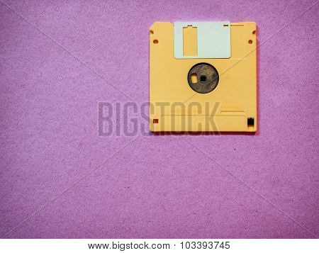 Vintage yellow floppy disk