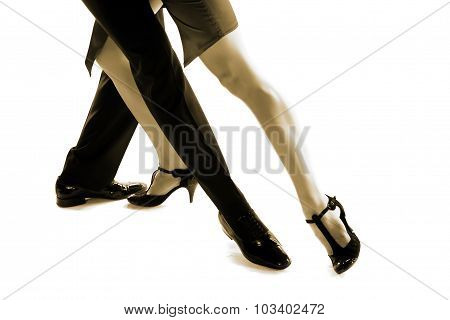 Two tango dancers passion on the floo