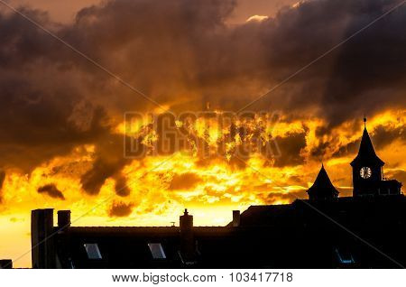 Autumn Background With Tower Clock And Orange Sky