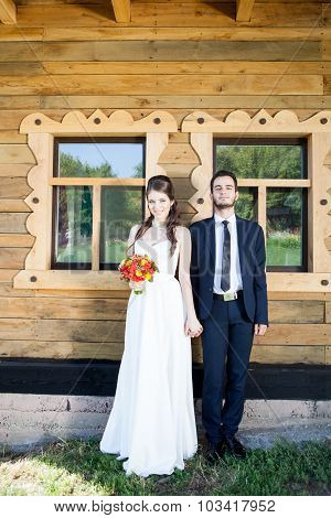 Bride And Groom Laughing And Holding Each Other Hand