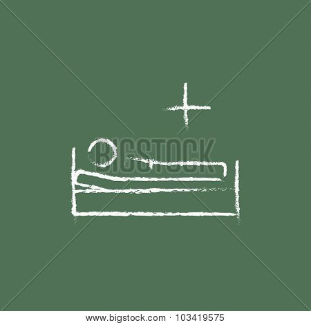 Patient lying on the bed hand drawn in chalk on a blackboard vector white icon isolated on a green background.