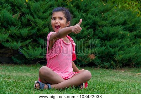 Excited Child Screaming And Showing Thumb Up, Gypsy Girl