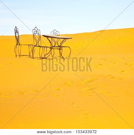 Table And Seat In Desert Sahara Morocco Africa Yellow Sand
