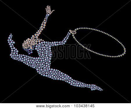 Jumping gymnast with hoop made with bright colored rhinestones on black backdrop.