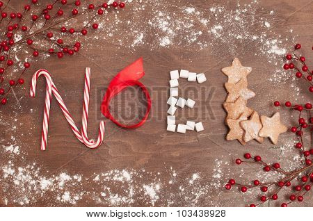 Christmas decorations and food on the wooden background