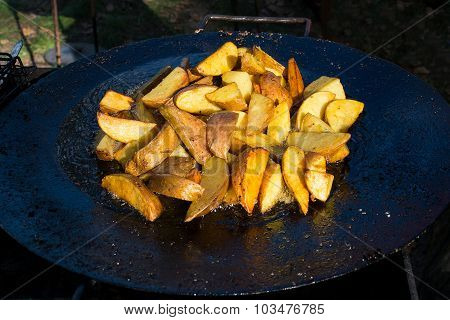 Fried Potato In Big Melal Pot.