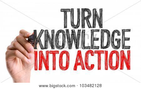 Hand with marker writing: Turn Knowledge into Action