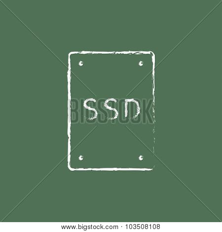 Solid state drive hand drawn in chalk on a blackboard vector white icon isolated on a green background.