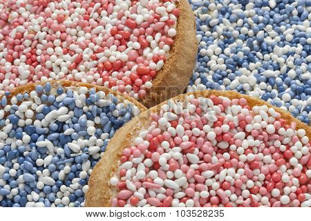 'Beschuit met muisjes, a traditional treat to celebrate the birth of a child in The Netherlands. Pink  sprinkles for a girl, blue for a boy