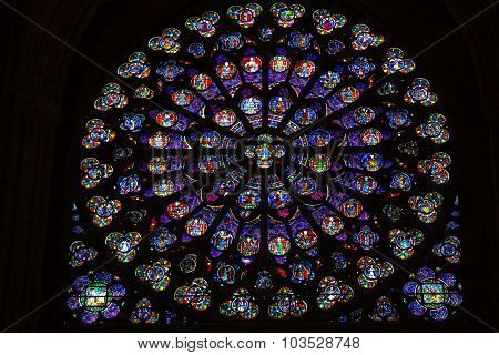 PARIS FRANCE - SEPT 8, 2014: Paris Notre Dame Cathedral. South transept rose window. UNESCO World Heritage Site. Paris France