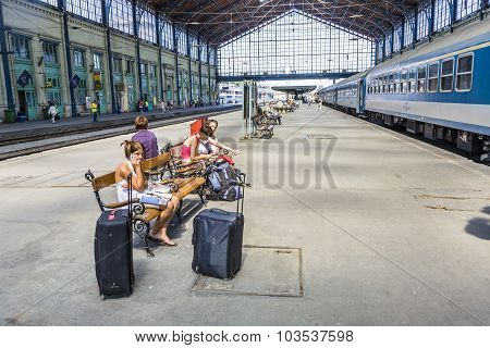 Unidentified People Wait At  The Train Station In Budapest