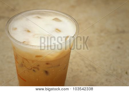 Iced Coffee On A Background Of Cement.