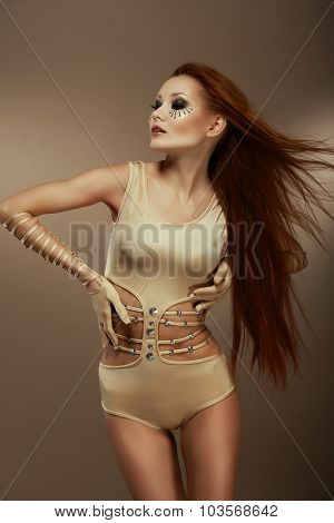 Performance. Red Head Woman In Stagy Costume