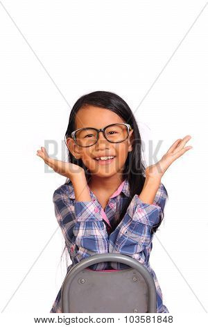Little Girl Smiling And Showing Hurray Gesture