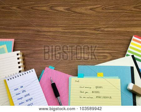 Hindi; Learning New Language Writing Words On The Notebook
