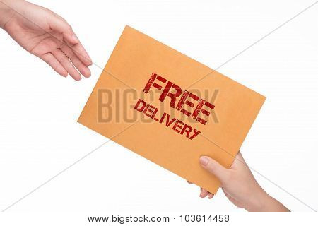 woman's hand passes the envelope male hand. yellow envelope in the hand isolated on white background. Free delivery
