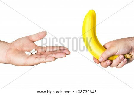 Pills And Big Banana In Man Hands
