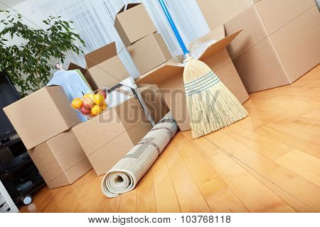 Moving boxes in new apartment. Real estate concept.