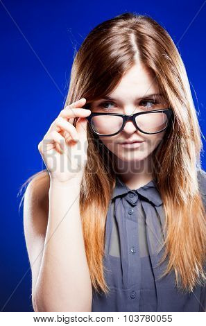 Strict Young Woman With Nerd Glasses