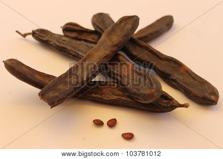 Carob pods dry with seeds
