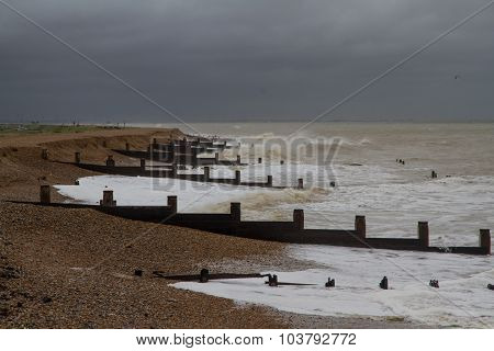Stormy English Beach With Groynes