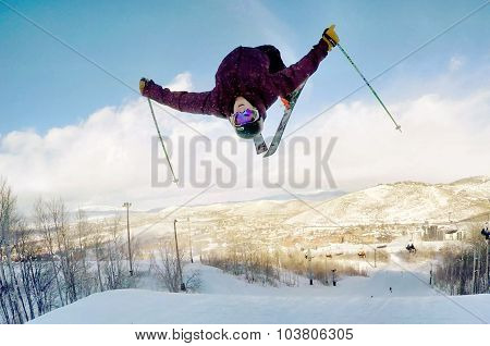 Skier mid backflip