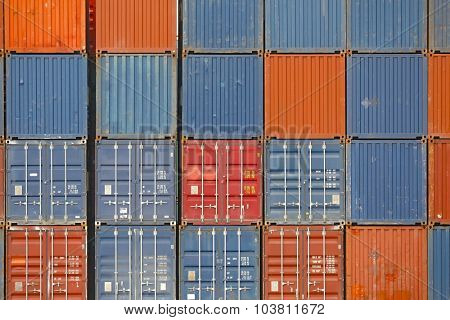 Stacked containers in a shipping terminal