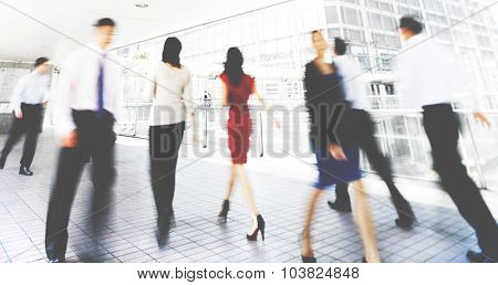Business People in Motion Commuter Walking Concept