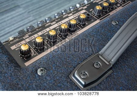 Button Of Keyboard Power Amplifier, Closeup View Background