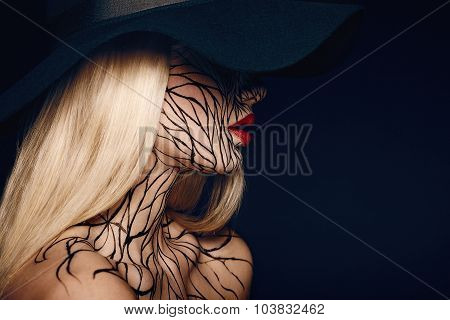 fashion portrait of girl with faceart