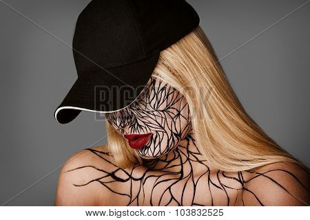 fashion portrait of girl with faceart