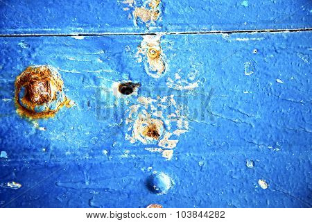 Dirty Stripped Paint In   Red   And Rusty Nail